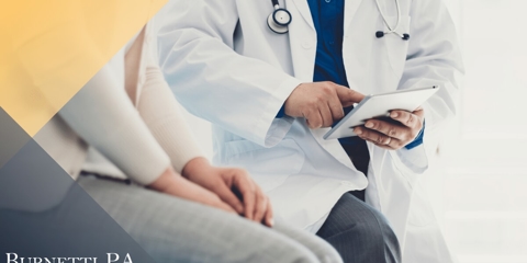 doctor speaking with a patient