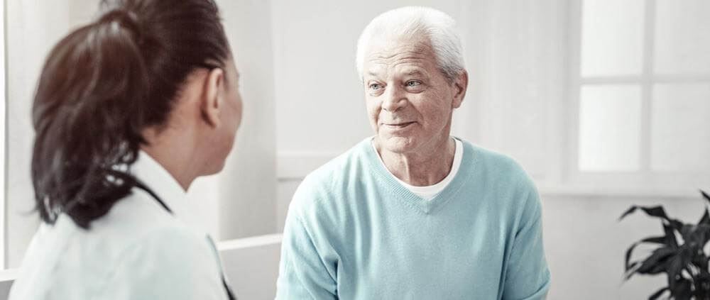 A doctor and a patient talking