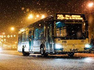 bus driving in the snow