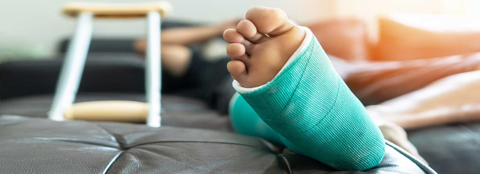 Close up of a foot in a green cast