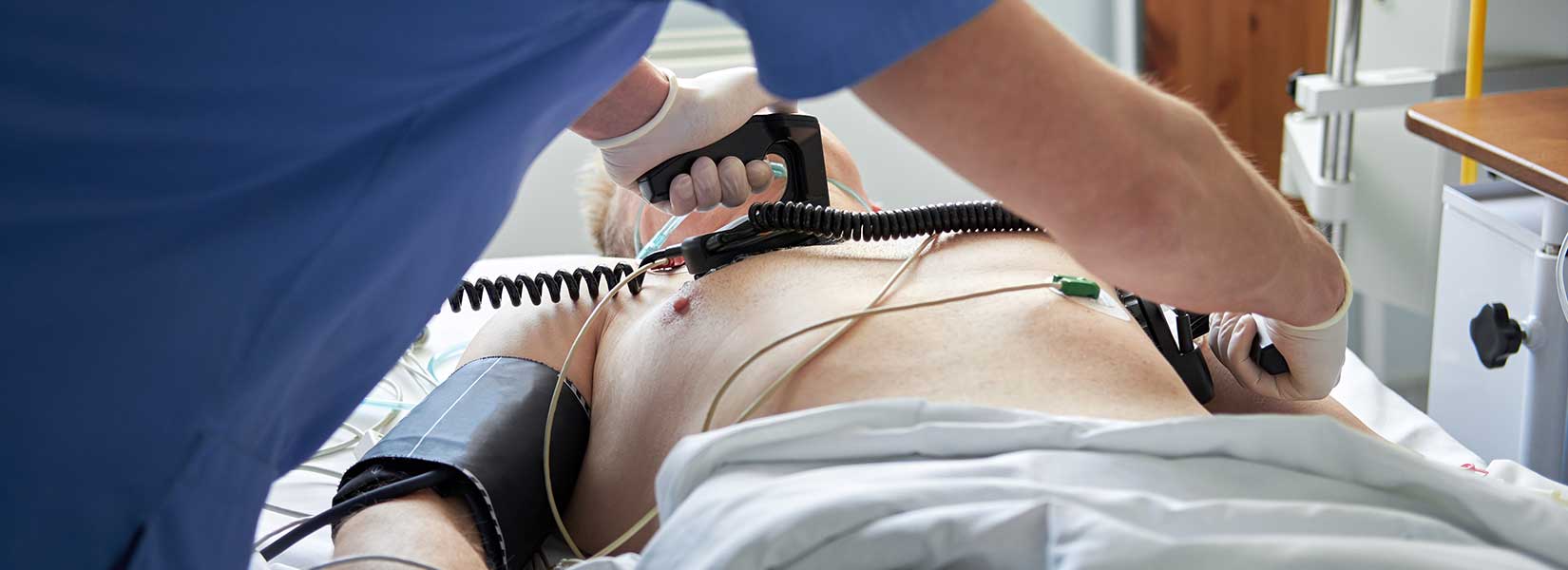 nurse reviving a patient