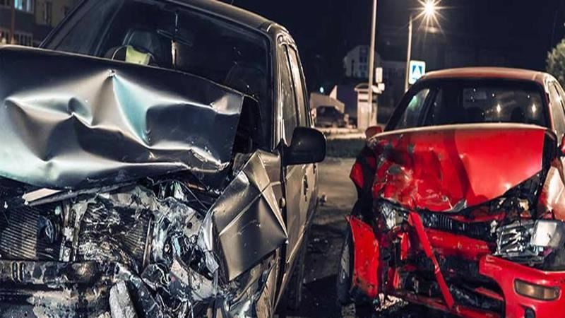 Two cars with damaged front end