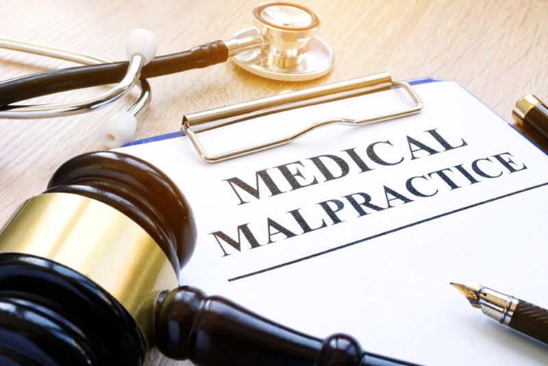 Court Gavel and Medical Malpractice document