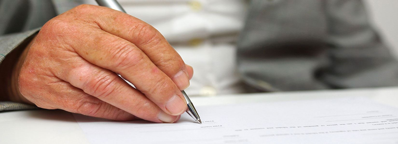man writting a letter
